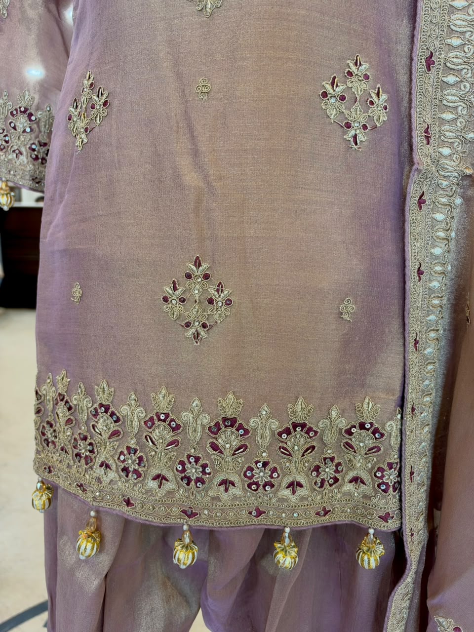 Elegant ensemble is crafted in a beautiful lavender Tissue Silk