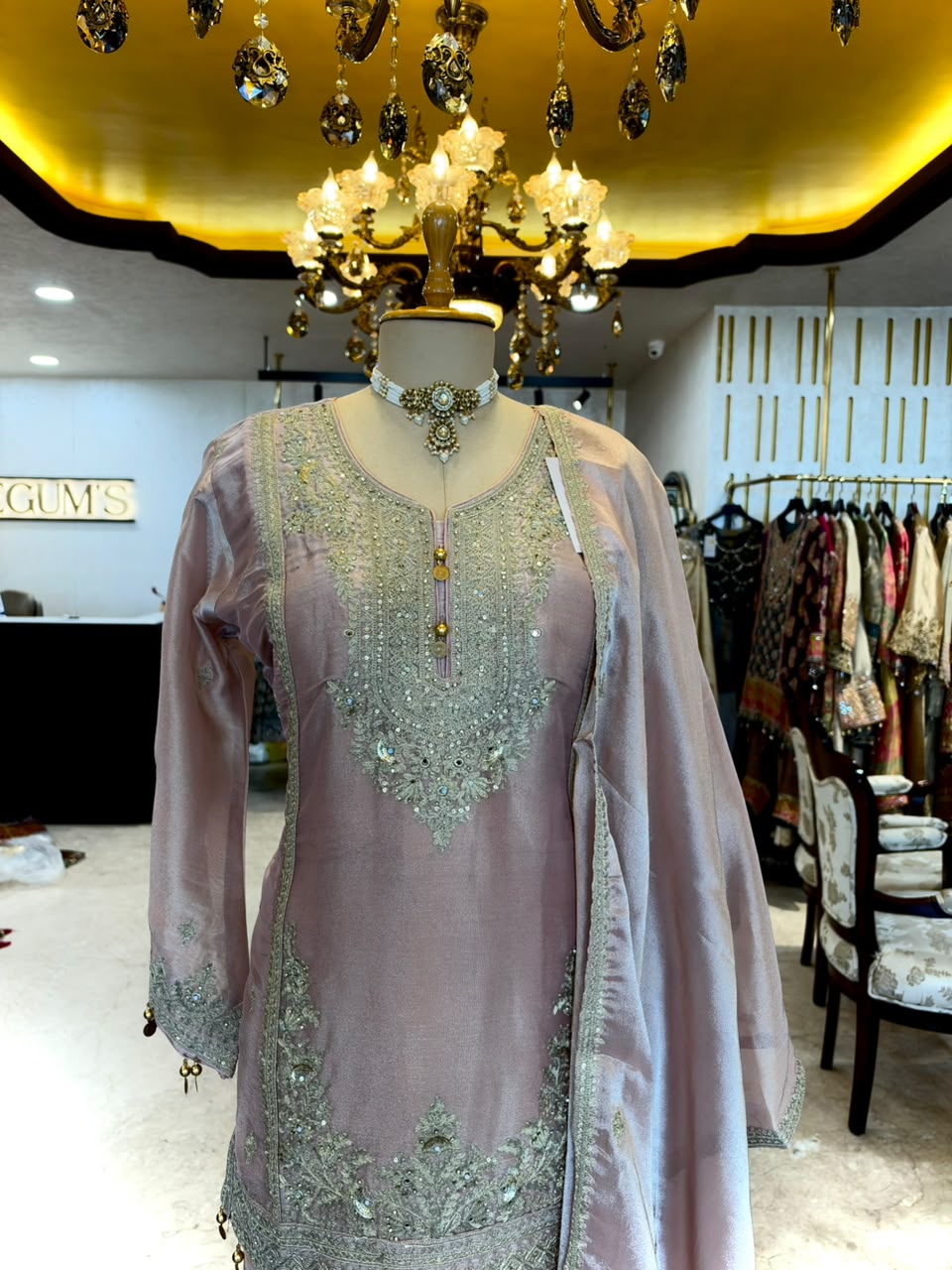 Elegant ensemble is crafted in a soft Blush Pink Tissue Silk