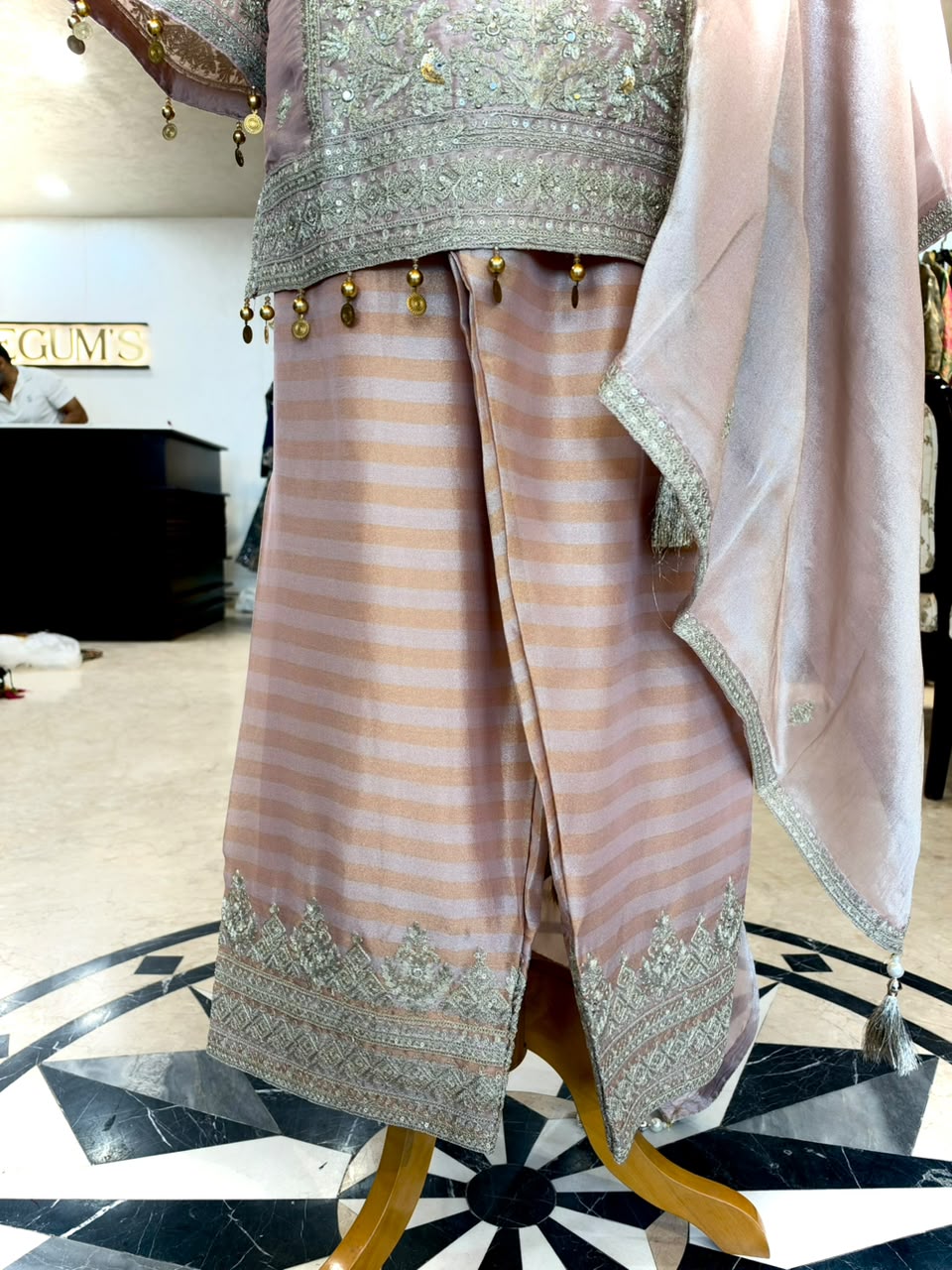 Elegant ensemble is crafted in a soft Blush Pink Tissue Silk