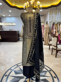 Regal ensemble is crafted in a luxurious deep black Kim Khaab