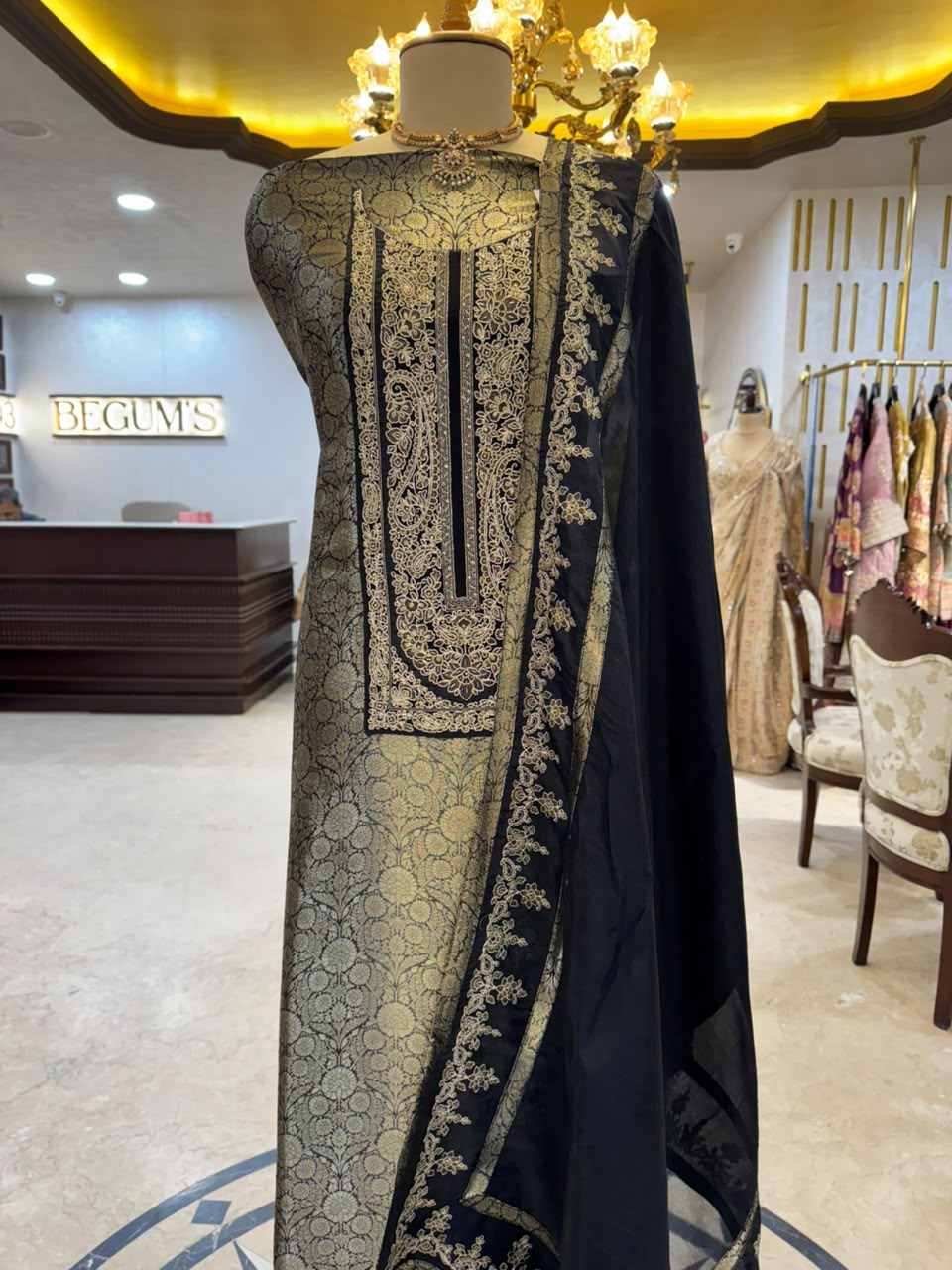 Regal ensemble is crafted in a luxurious deep black Kim Khaab