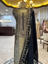 Regal ensemble is crafted in a luxurious deep black Kim Khaab