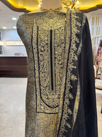 Regal ensemble is crafted in a luxurious deep black Kim Khaab