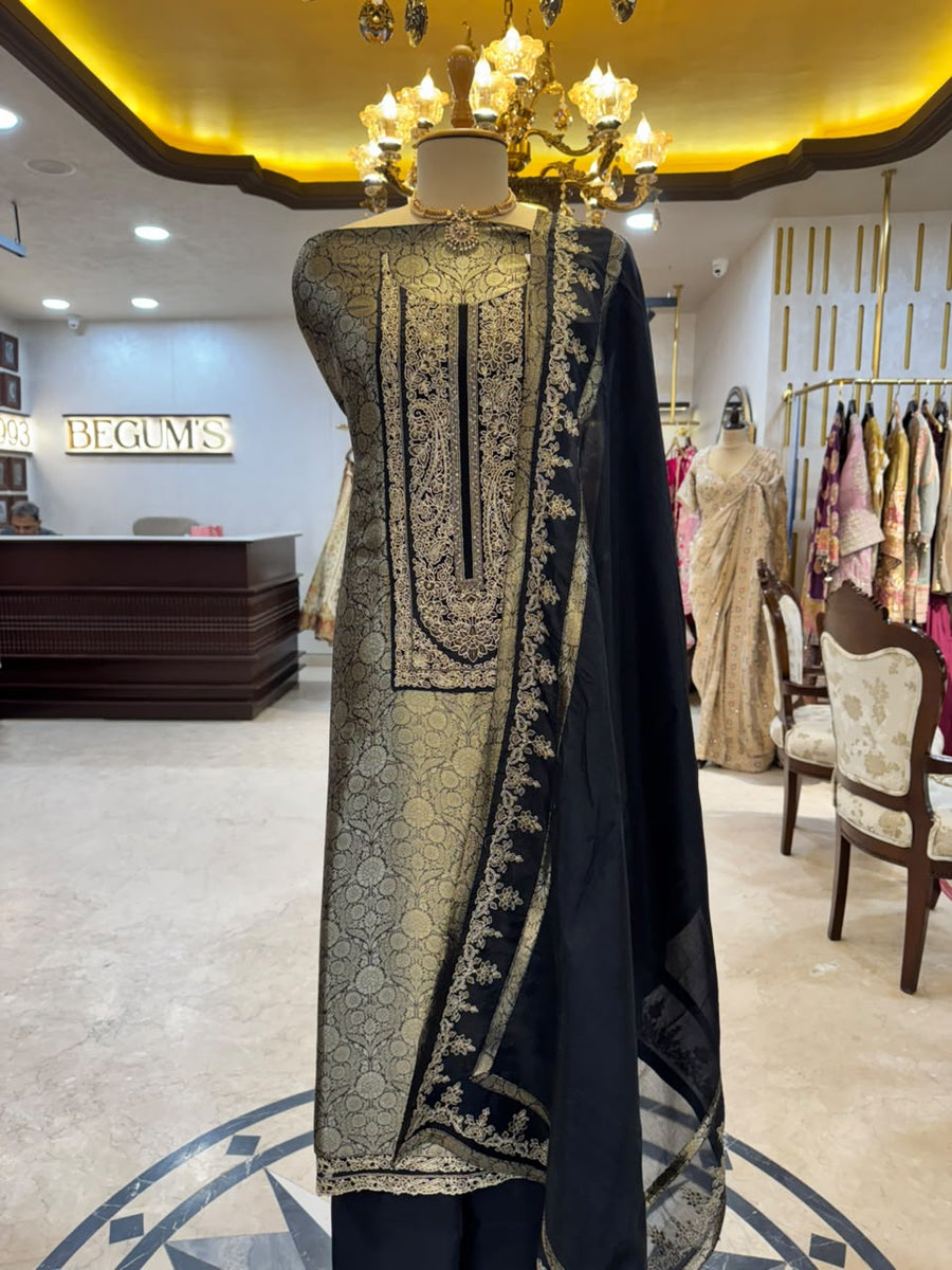 Regal ensemble is crafted in a luxurious deep black Kim Khaab