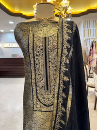 Regal ensemble is crafted in a luxurious deep black Kim Khaab