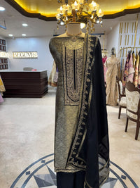 Regal ensemble is crafted in a luxurious deep black Kim Khaab