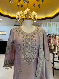 Elegant ensemble is crafted in a beautiful lavender Tissue Silk