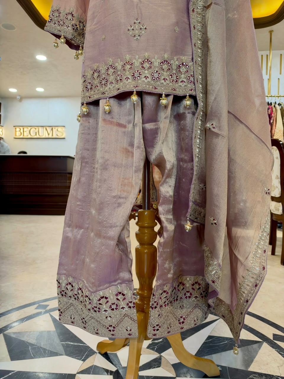 Elegant ensemble is crafted in a beautiful lavender Tissue Silk
