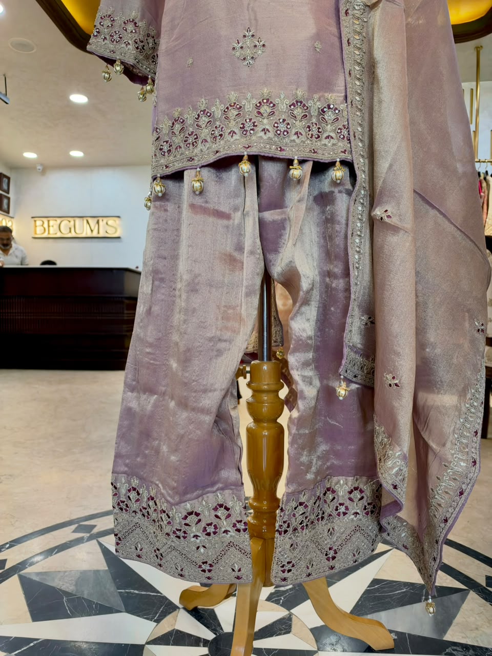 Elegant ensemble is crafted in a beautiful lavender Tissue Silk