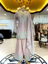 Elegant ensemble is crafted in a soft Blush Pink Tissue Silk