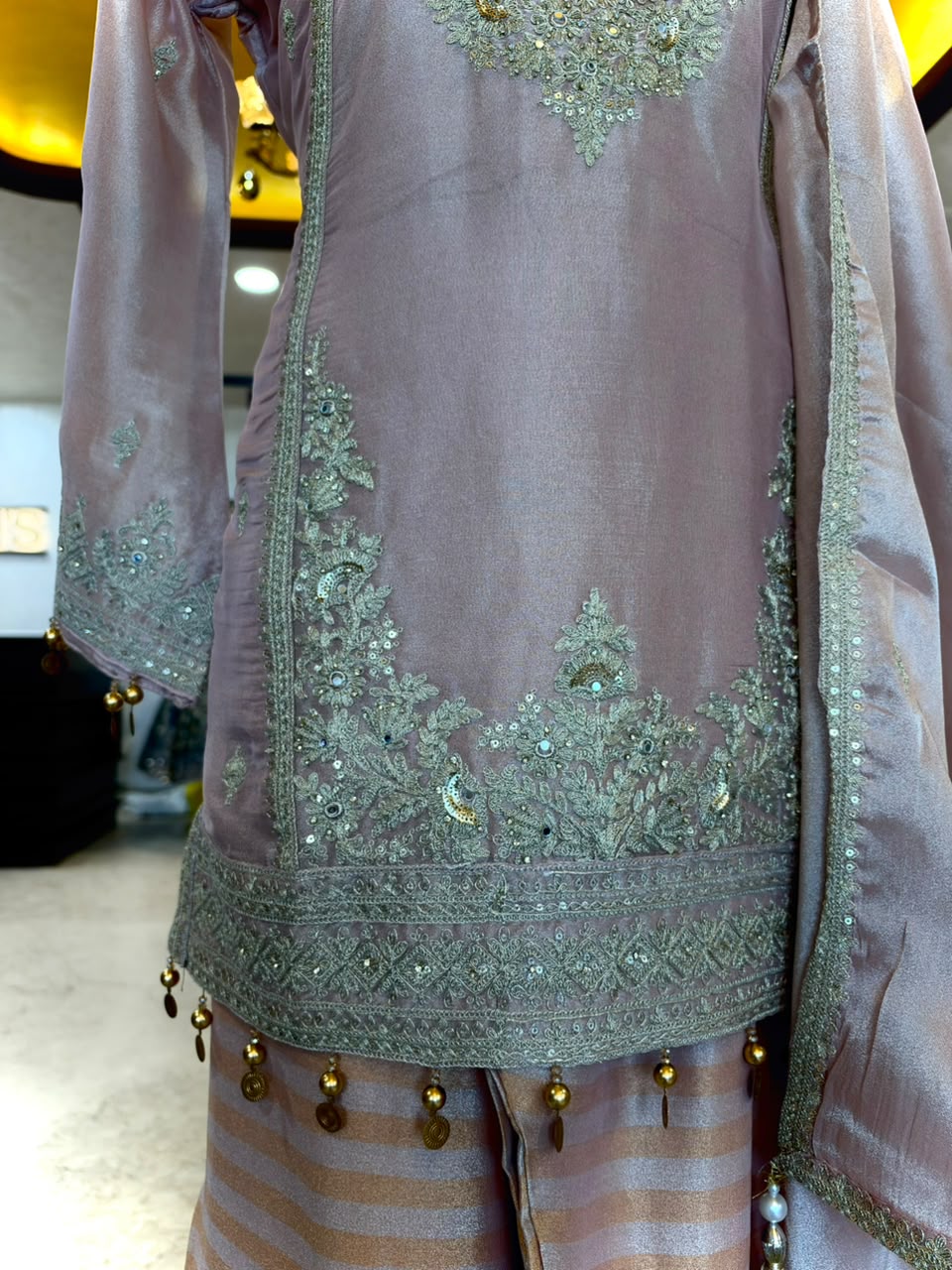 Elegant ensemble is crafted in a soft Blush Pink Tissue Silk