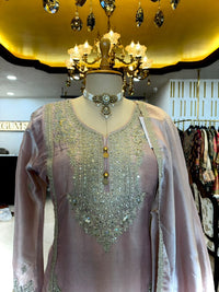Elegant ensemble is crafted in a soft Blush Pink Tissue Silk