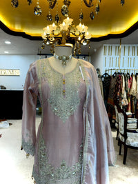 Elegant ensemble is crafted in a soft Blush Pink Tissue Silk