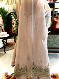 Elegant ensemble is crafted in a soft Blush Pink Tissue Silk